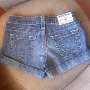 True Religion rolled denim shorts.